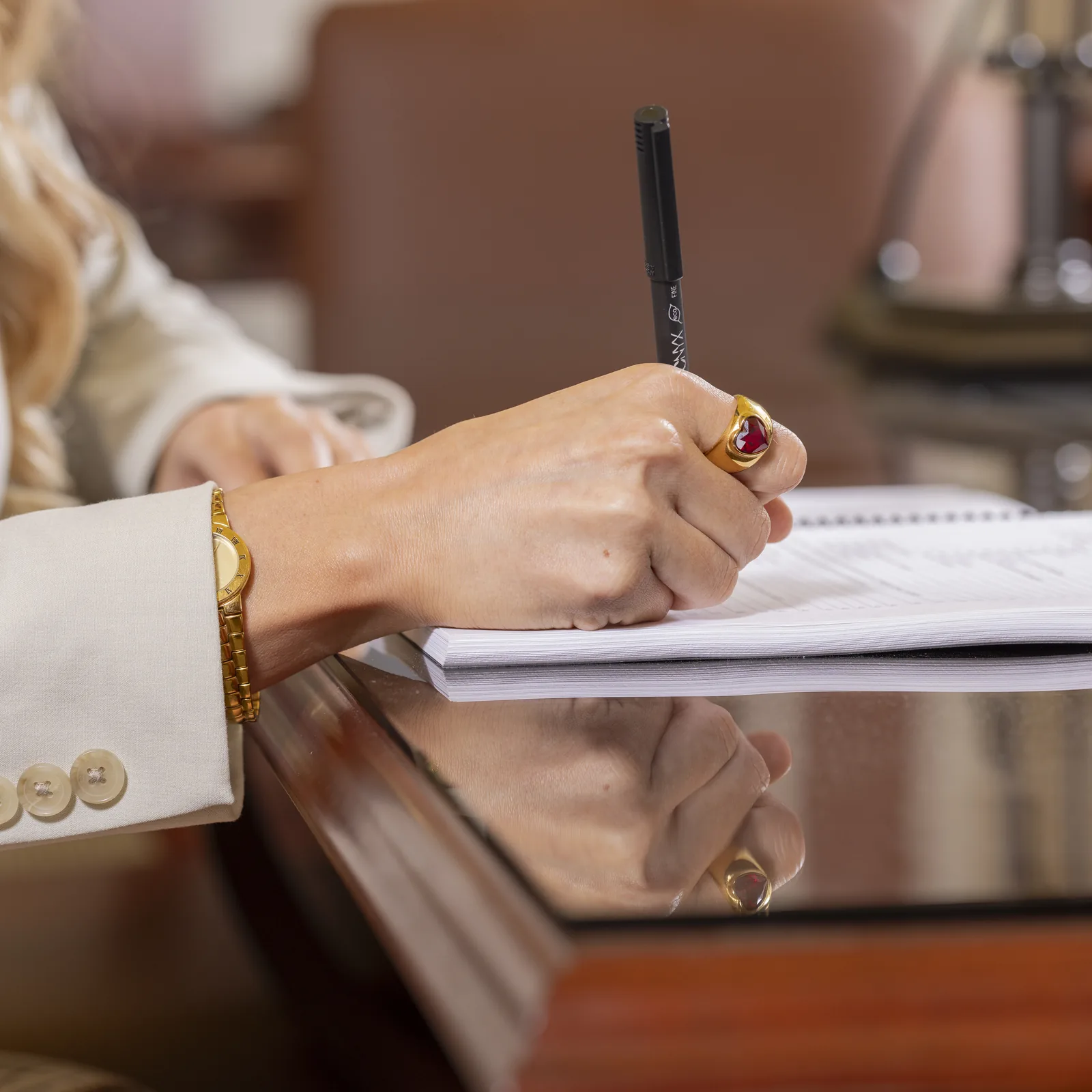 Attorney Alexa Smart making notes on a client's case file